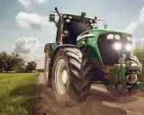 Zielony traktor pędzi po polnej drodze, gotowy do pracy. To maszyna rolnicza, której zakup jest ważną umową kupna sprzedaży.