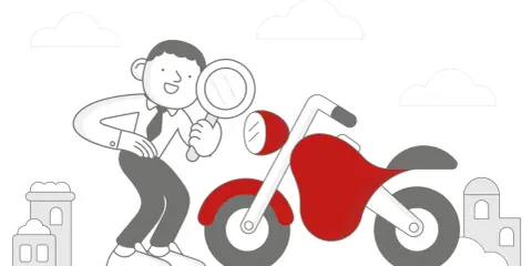 Mężczyzna z lupą dokonuje przeglądu motocykla.