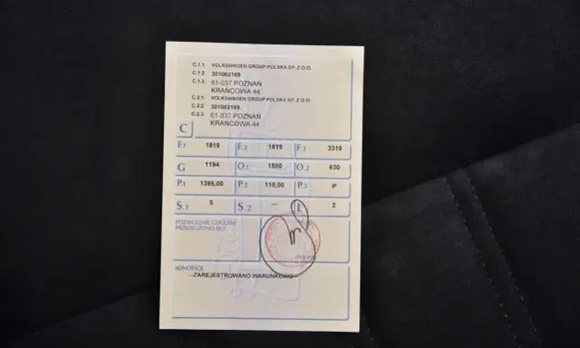 Tymczasowy dowód rejestracyjny z danymi pojazdu i adnotacją "ZAREJESTROWANO WARUNKOWO".