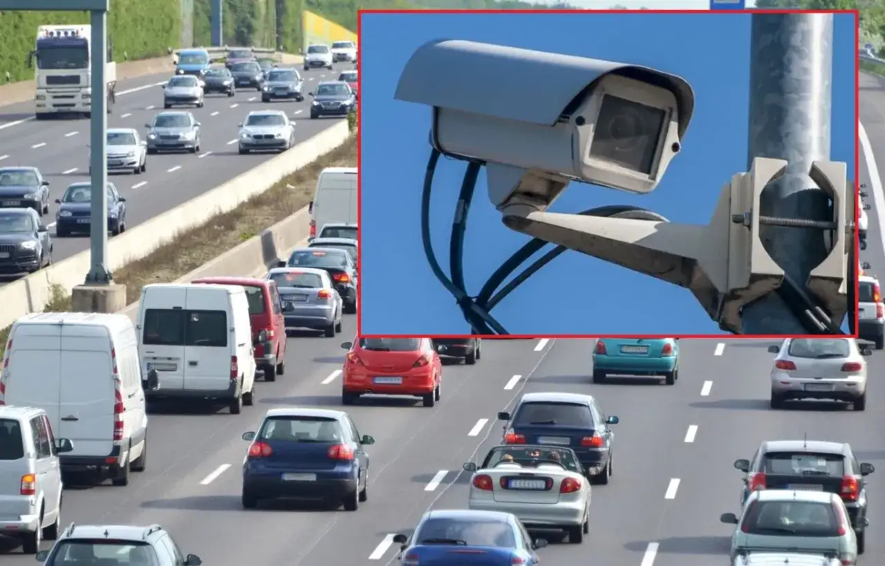 Kamera monitoringu miejskiego na autostradzie, gotowa do wystawienia mandatu za przekroczenie prędkości.